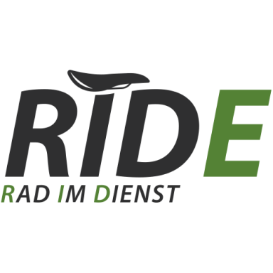 Logo von RIDE - Rad im Dienst, zeigt den Schriftzug in Schwarz und Grün mit einem Fahrradsattel.
